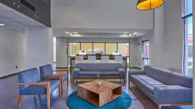 Modern hotel meeting room at City Express Marriott for corporate events and business networking.