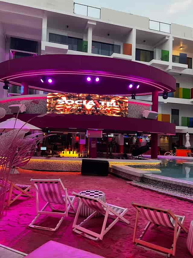 Socialtel poolside restaurant with LED lighting for corporate networking and brand events.