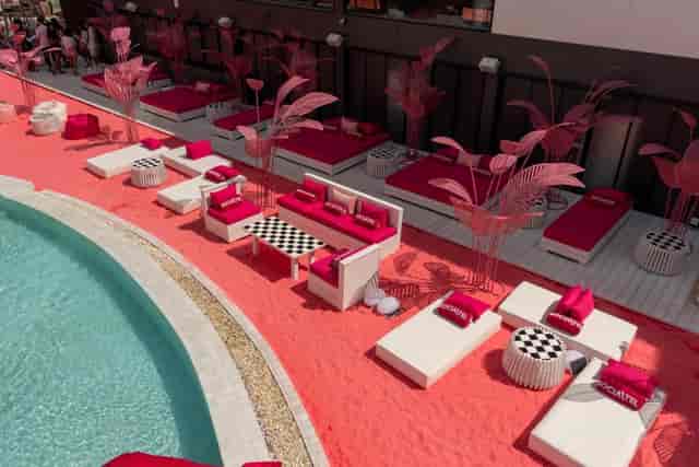 Pink poolside lounge at Socialtel, perfect for summer brand activations and social gatherings.