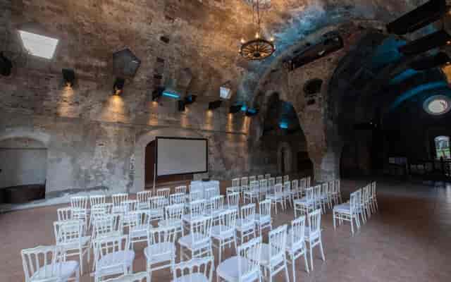 Salón Trapiche at Hacienda Cocoyoc: Historic stone venue set for theater-style corporate events.
