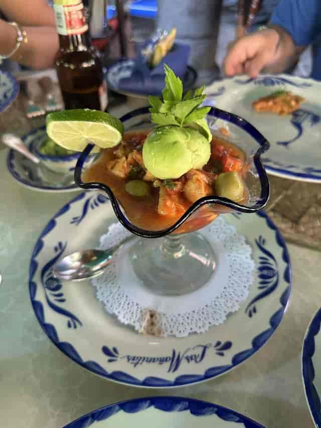 Shrimp cocktail appetizer for coastal wedding reception and upscale event catering.