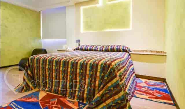 Hotel Siesta del Sur guest room for casual event lodging and budget travel accommodation.