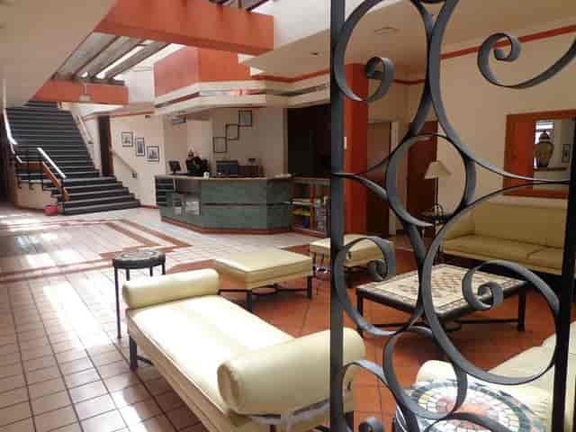 Hotel Granada lobby with dated architectural layout, ideal for event space and venue renovation.