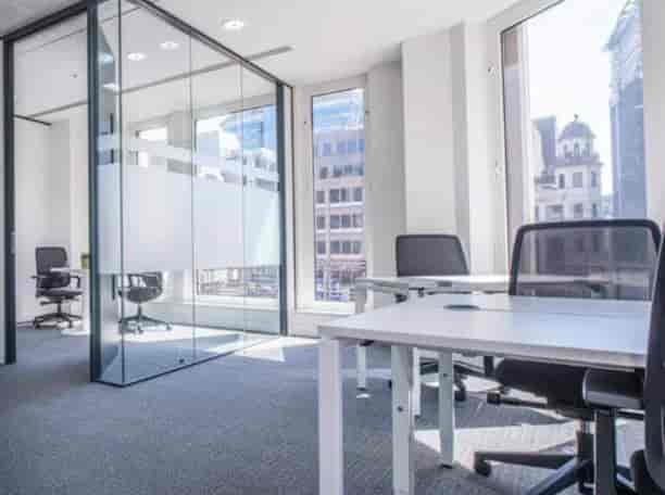 Virtual office rental in Spaces Revolucion, bright meeting room for agile team breakout sessions.