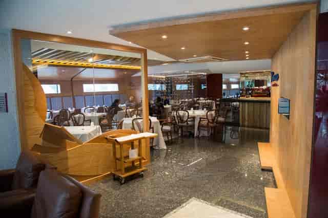 Upscale Grand Prix Hotel restaurant for corporate dinners and VIP event hosting.