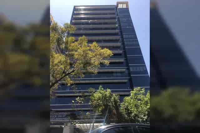 Modern glass office at Miguel de Cervantes 169 for corporate meetings and executive retreats.