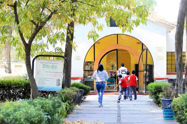 Casa de Las Bombas Cultural Center venue entryway, cluttered event space, professional venue hire.