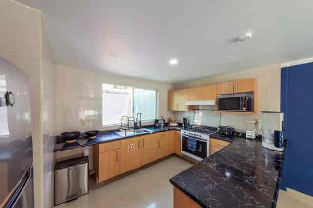 Standard double shared bathroom kitchen, ideal for corporate retreat catering and event staging.