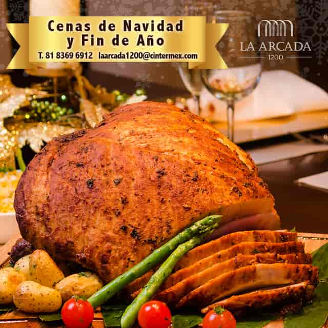 Roasted ham banquet centerpiece for upscale corporate gala catering.
