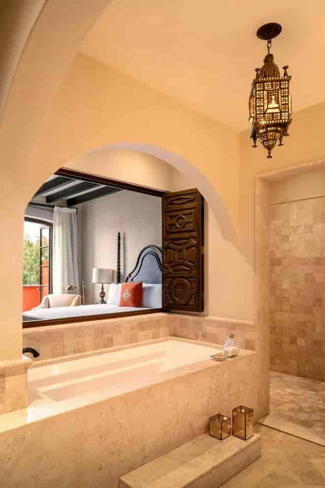 Luxury resort suite at Rosewood San Miguel de Allende with unique architectural passthrough design.