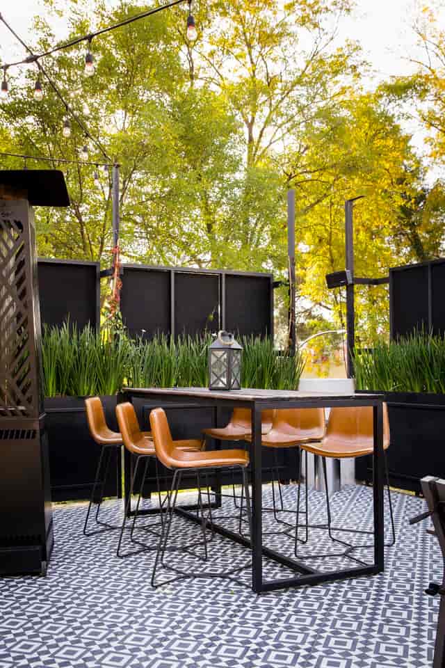 Modern terrace event space with modular seating for networking and corporate breakout sessions.