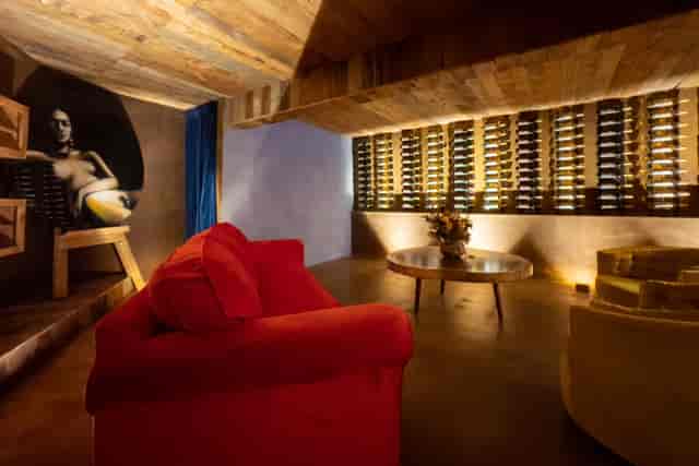 VIP green room at Casa Frida with wine wall for exclusive stakeholder negotiations and events.