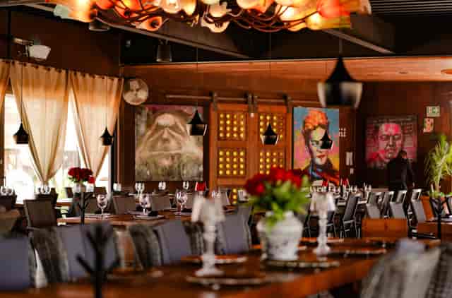 Sophisticated restaurant venue with dramatic lighting for corporate dinners and networking events.