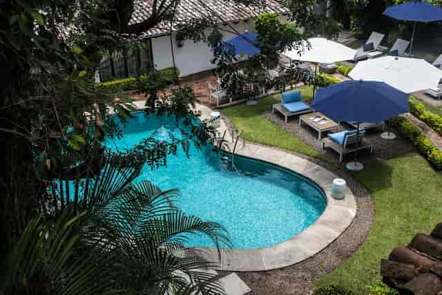 Outdoor garden poolside retreat at Las Casas Boutique Hotel for corporate incentives and networking.