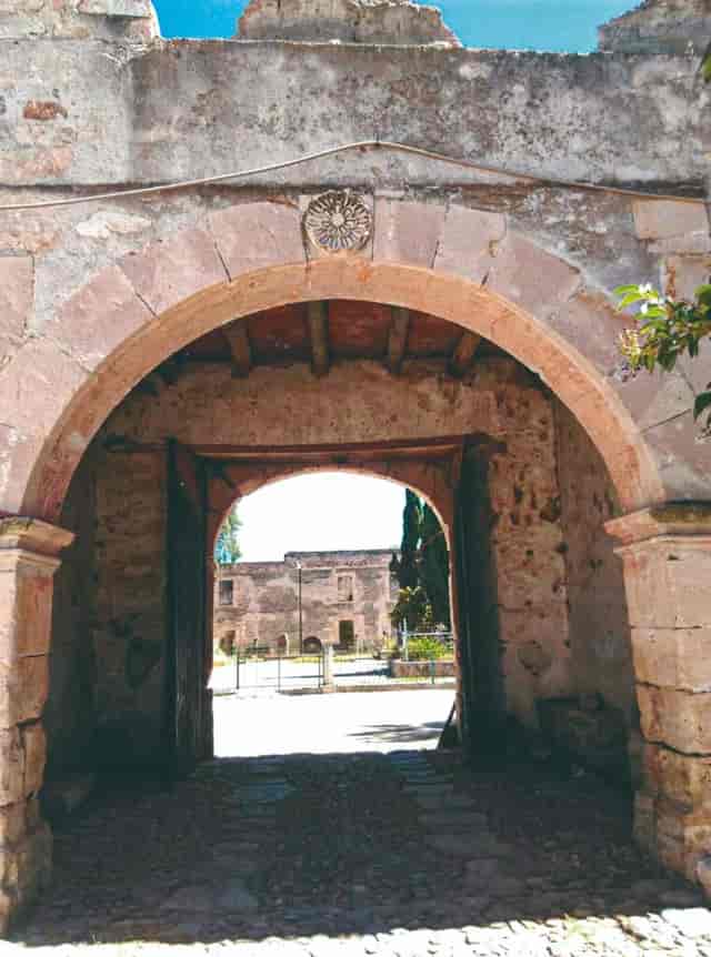 Historic stone archway entrance at Hacienda de San Nicolás for wedding or corporate event venue.