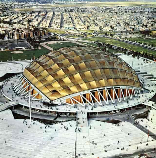 Palacio de los Deportes arena exterior, iconic architecture for trade shows and sporting events.