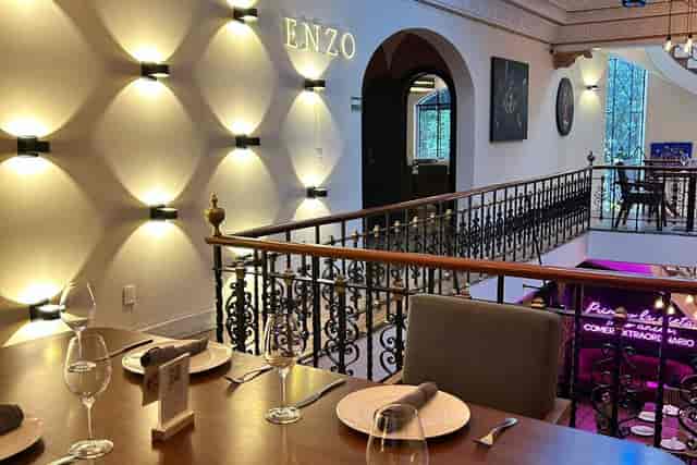 Upscale private dining room with architectural lighting for corporate events and VIP dinners.