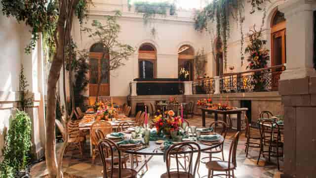 General Prim open-air atrium event venue for boutique weddings and corporate dinners.