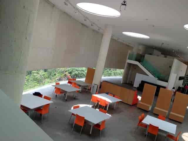 Modern MUAC Museum conference lounge with modular seating for corporate events and networking.
