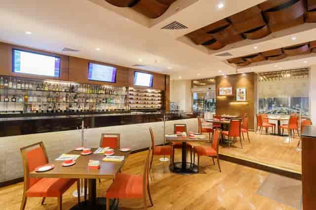 Modern restaurant with AV screens, perfect for networking mixers and corporate events.