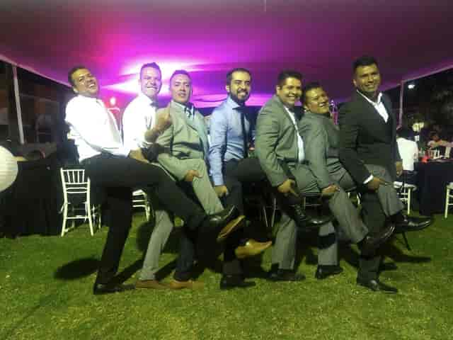 Hacienda la Esmeralda lawn social event with tension tent lighting for corporate party venue.