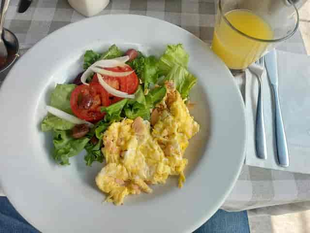 Healthy conference breakfast with eggs and greens at El Convite for corporate event catering.