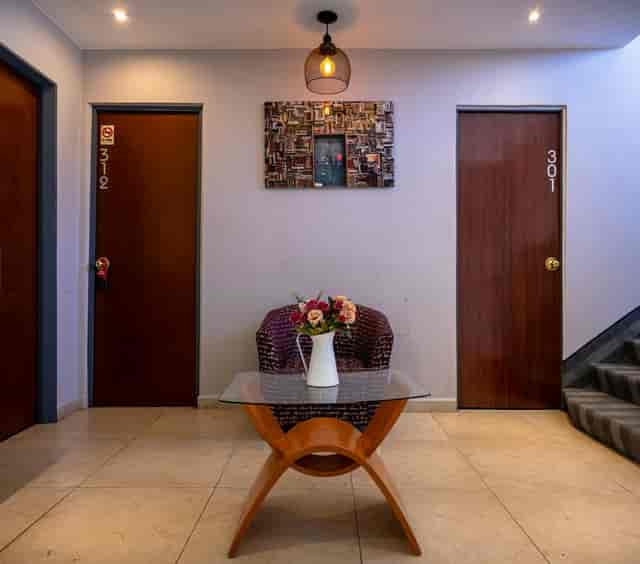 Superior Queen Room at Hotel Monarca, dated breakout space for professional corporate events.