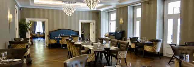 Upscale private dining room at Hotel Royal Savoy Lausanne for executive meetings and events.