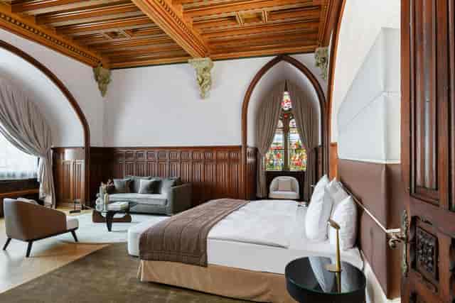 Vinothèque VIP suite at Château d'Ouchy, historic private meeting space for executive events.
