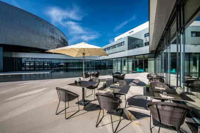 Aquatis Hotel Europe room terrace for corporate event networking and outdoor receptions.