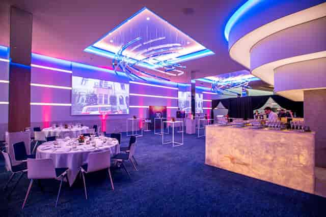 Modern Millennium Center event space with banquet and networking zones for corporate conferences.