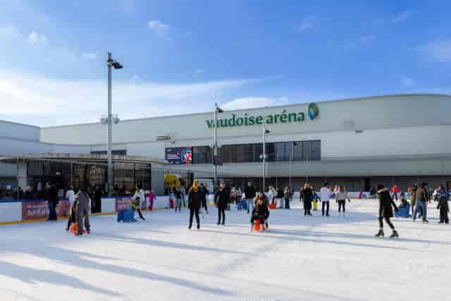 Vaudoise Aréna ice rink with seasonal outdoor plaza for winter event and sports venue activation.