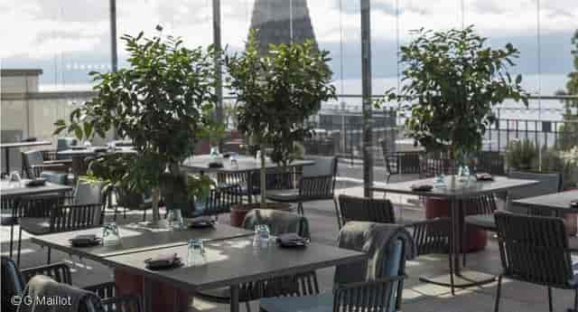 Modern open-air rooftop lounge for corporate cocktail receptions and upscale networking events.