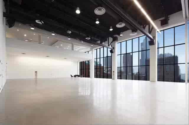 Spacious Spring Studios venue in NYC with large windows for events and city views.