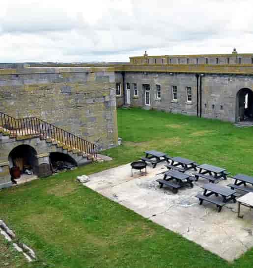 Thorne Island outdoor event venue with picnic seating for corporate gatherings and functions.