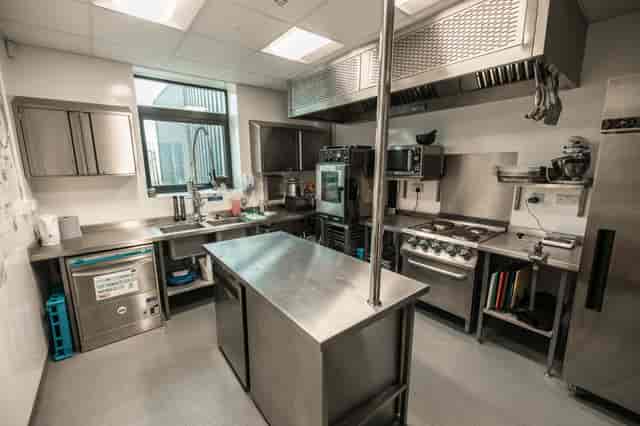 Compact catering kitchen for small-scale events and food service preparation.