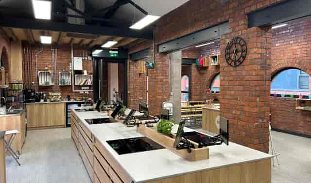 Industrial-chic cookery studio for corporate team building and experiential workshops.