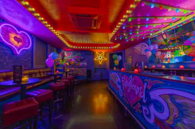 Vibrant party venue with neon lights, ideal for birthdays and themed events.