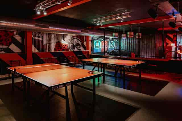 Vibrant Roxy Ball Room venue with ping pong tables for events in Manchester.