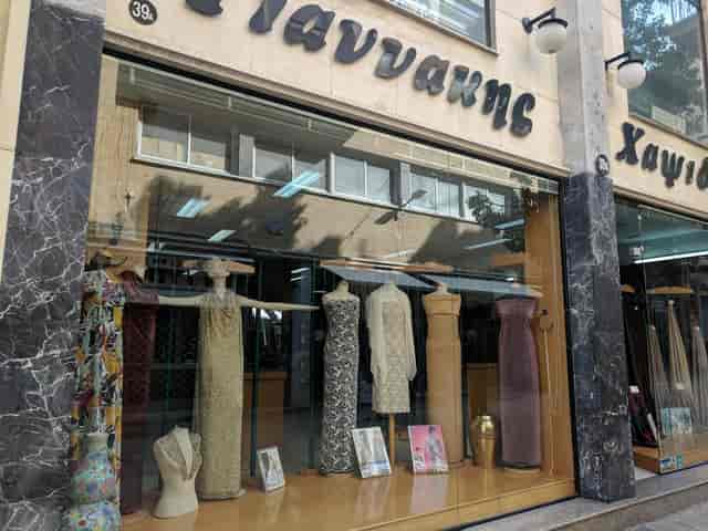 Royal Hall conference room storefront displaying formal evening wear for black-tie gala events.