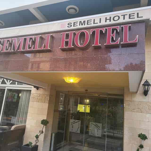 Semeli Hotel boutique exterior arrival area for budget travel and small event planning.