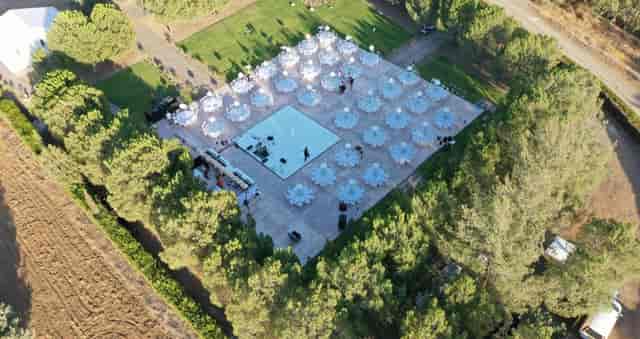 Outdoor wedding venue in Heritage featuring a square terrace dance floor for event planning.