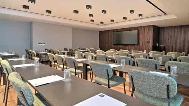 Corporate training room in Akamantis Business Center with classroom seating for workshops.