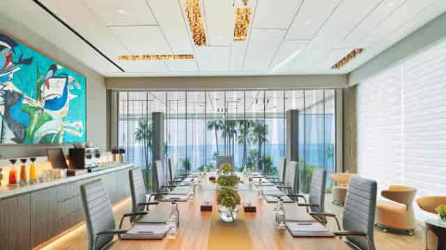 Boardroom at Akamantis Business Center with ocean view for executive retreats and presentations.