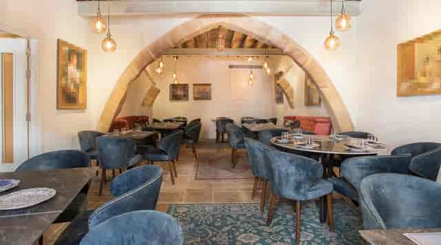 Madama Residence restaurant with arched interior for private dining and high-end networking events.