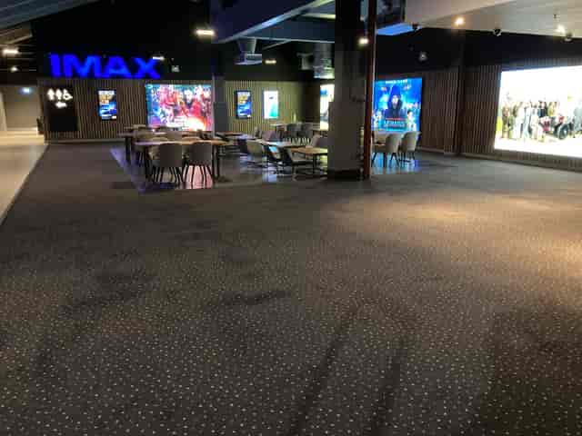 Cinema screens at Vue Manchester - Printworks, modern event space for networking and entertainment.