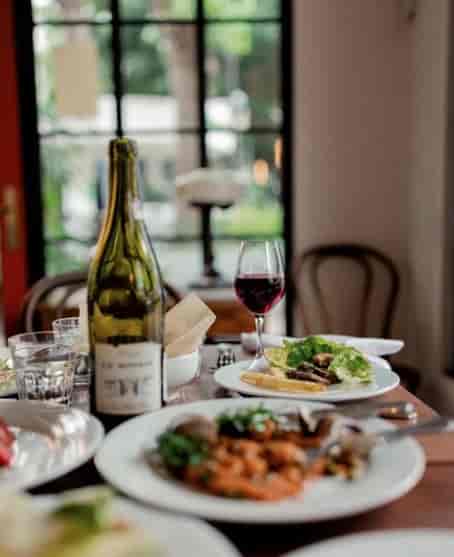 Il Becco restaurant: High-end networking dinner setting with fine dining and wine pairing.