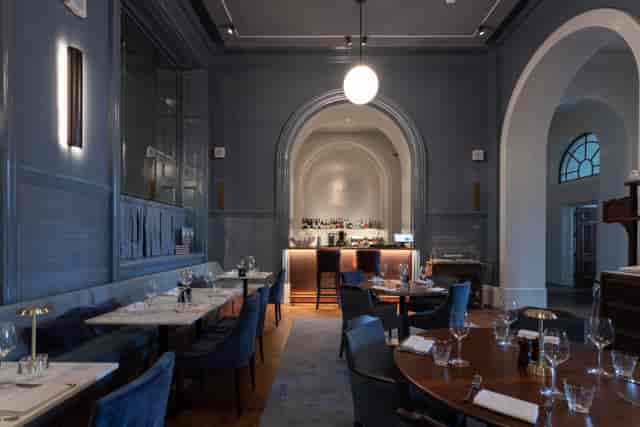 Supporters' House Blue Dining Room, stylish venue for upscale meetings and intimate gatherings.