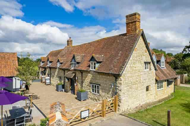 Main Restaurant at The Dinton Hermit: historic stone venue for corporate retreats and weddings.