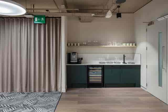 Modern Atrium break-out station for conference catering and beverage logistics.